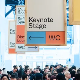 A keynote stage sign at a conference
