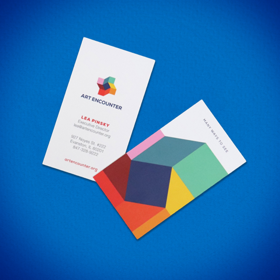 Custom business cards showing a front design and a colorful patterned back