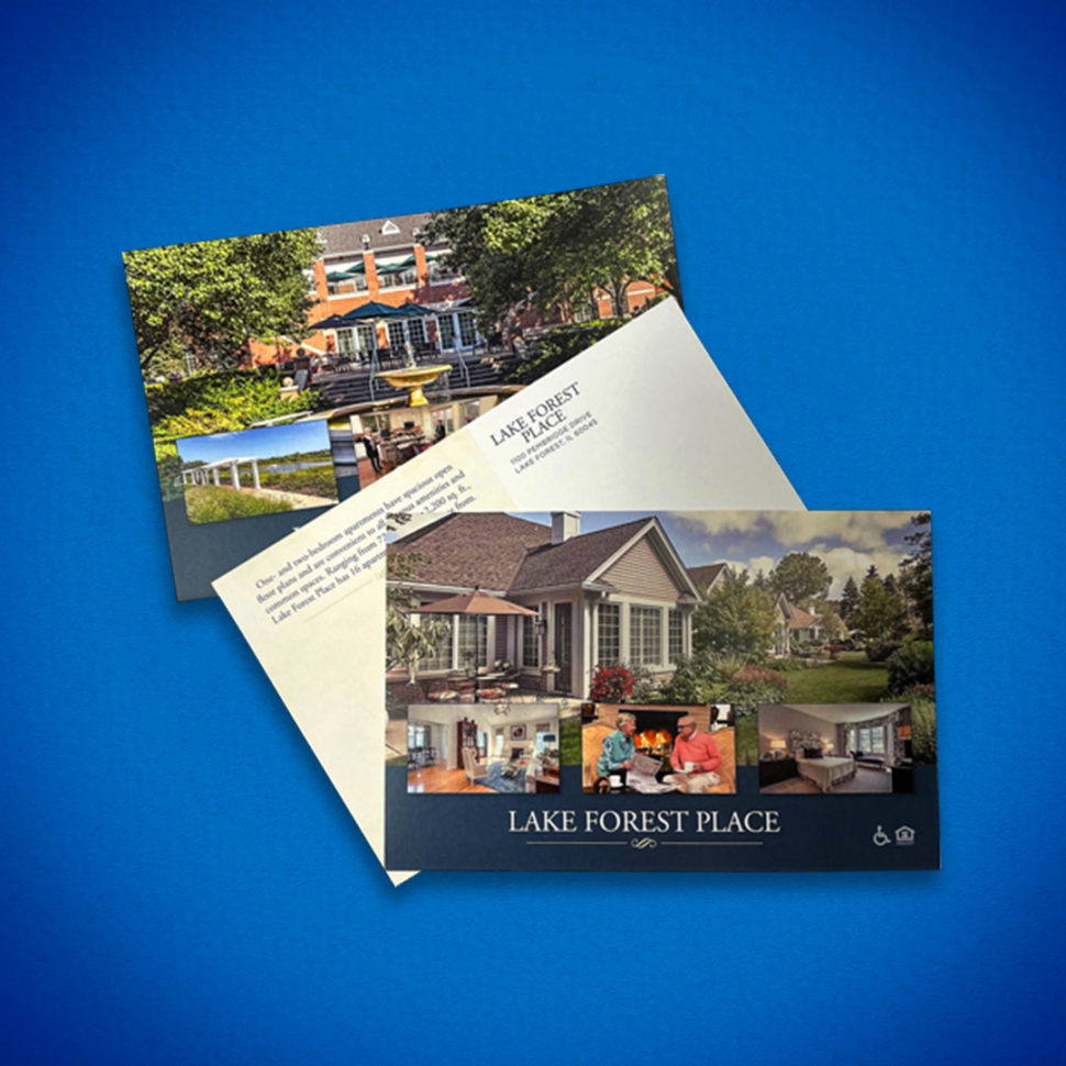 Custom printed postcards, front and back, fanned on a blue background