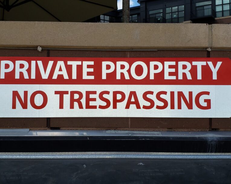 Custom reflective private property sign used for visibility, safety, and property identification