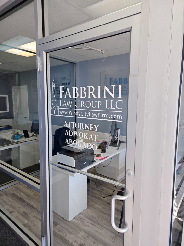 Custom window graphic for Fabbrini Law Group featuring white vinyl lettering and clear branding for exterior office signage