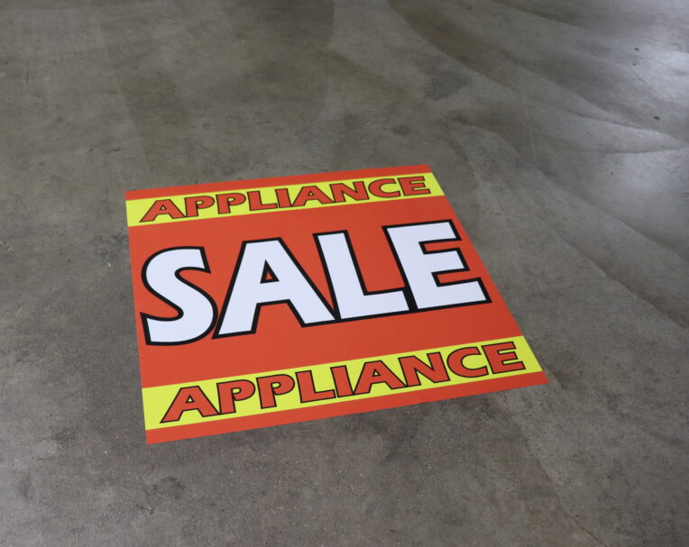 Custom floor graphic for appliance sale featuring bold text and durable, slip-resistant material for in-store promotion