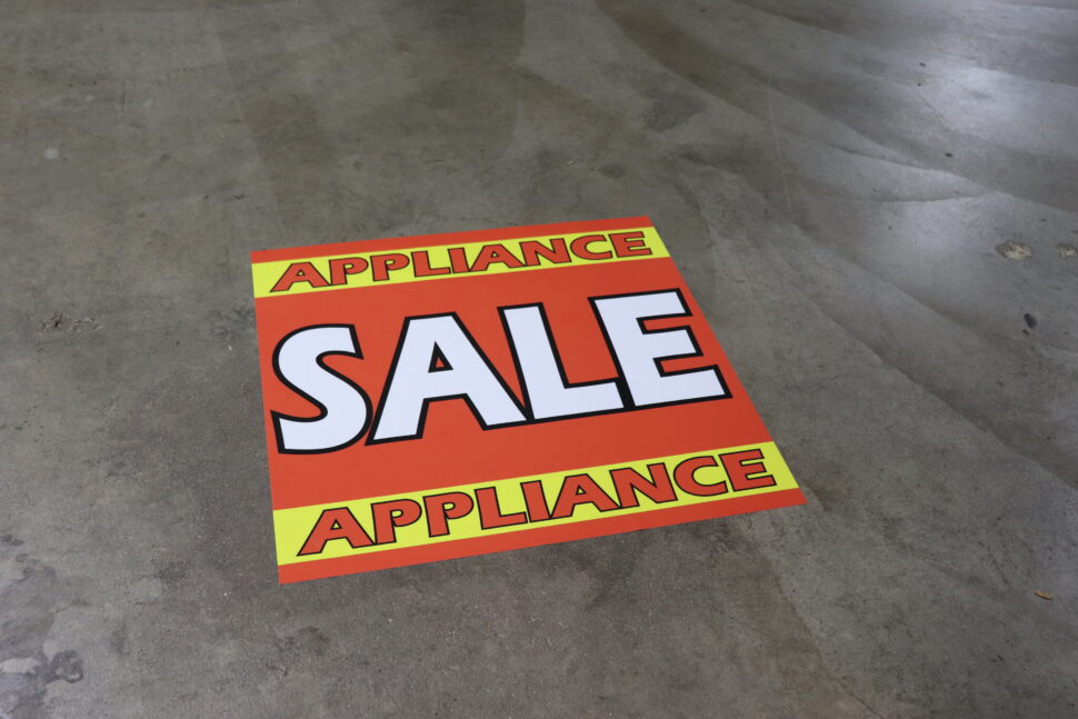 IMG_9752 (1) Custom floor graphic for appliance sale featuring bold text and durable, slip-resistant material for in-store promotion