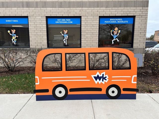 Full-color printed bus for Willow Creek featuring bold branding and custom graphics for mobile outreach and visibility
