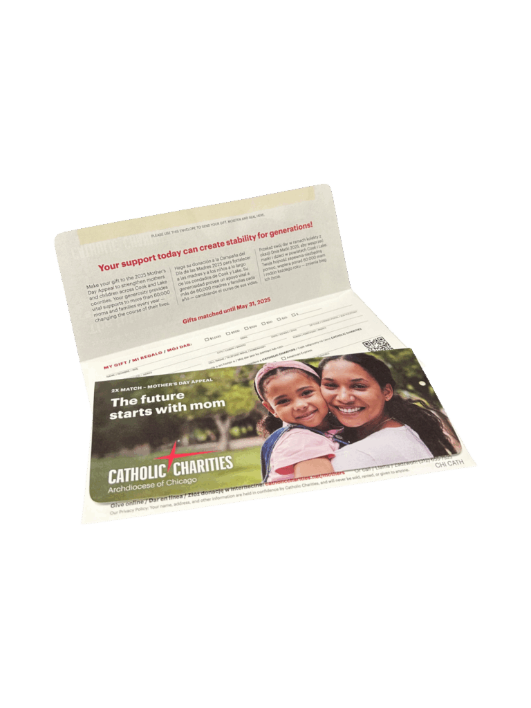 Custom remittance envelope for Catholic Charities featuring donation form and full-color branding for fundraising mailers