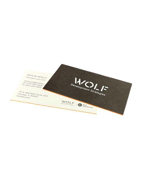 Custom business card for Wolf Development featuring branded colors, modern typography, and high-quality print