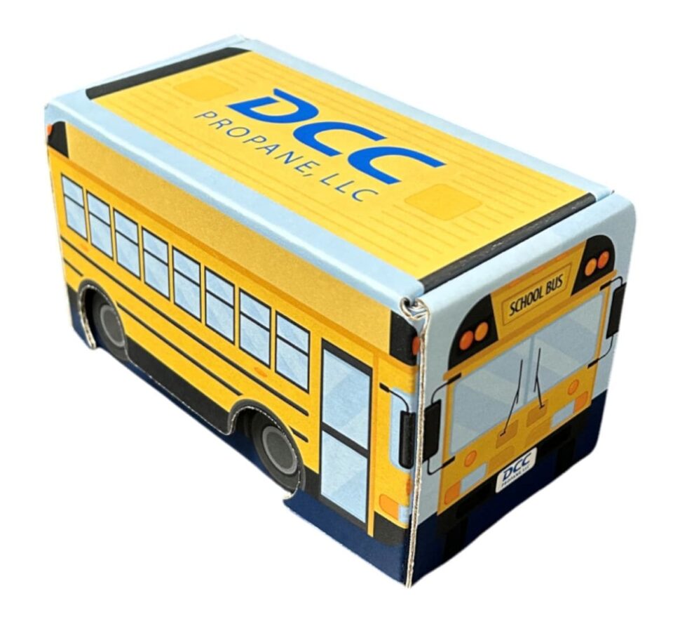 Custom REFT bus-shaped mailer box with full-color print and insert tray, designed for a playful unboxing experience