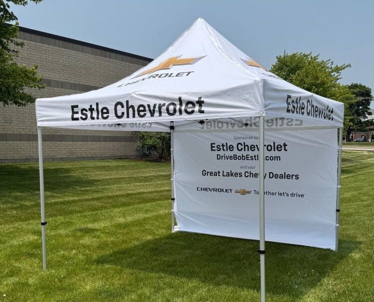 Custom printed event tent for Estle Chevrolet with branded graphics for dealership promotions and outdoor events