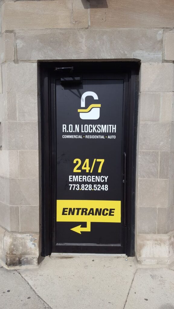r-o-n-locksmith Custom door graphics for a locksmith business featuring cut vinyl lettering and bold branding