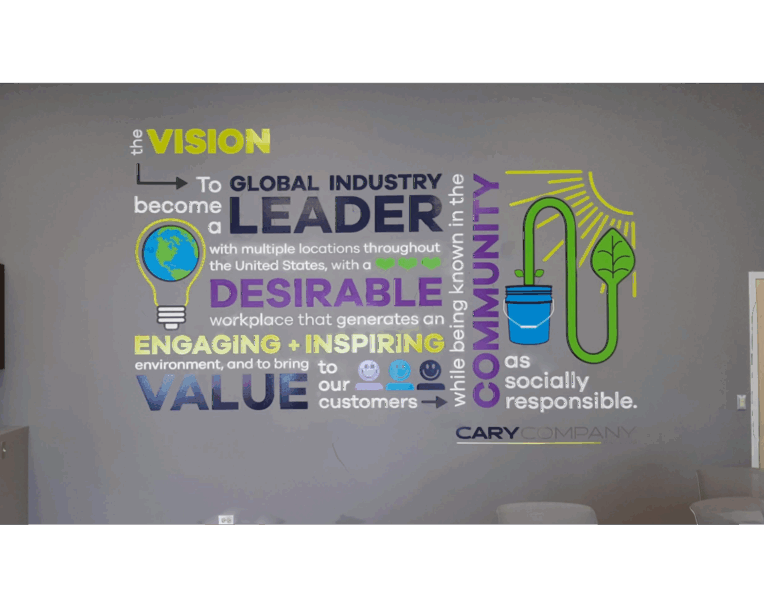 Custom wall graphics for Cary featuring large-format vinyl, bold text, and branded design for interior office space
