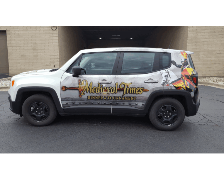 Custom vehicle wrap for Medieval Times featuring bold, full-color graphics and branded design for mobile promotion