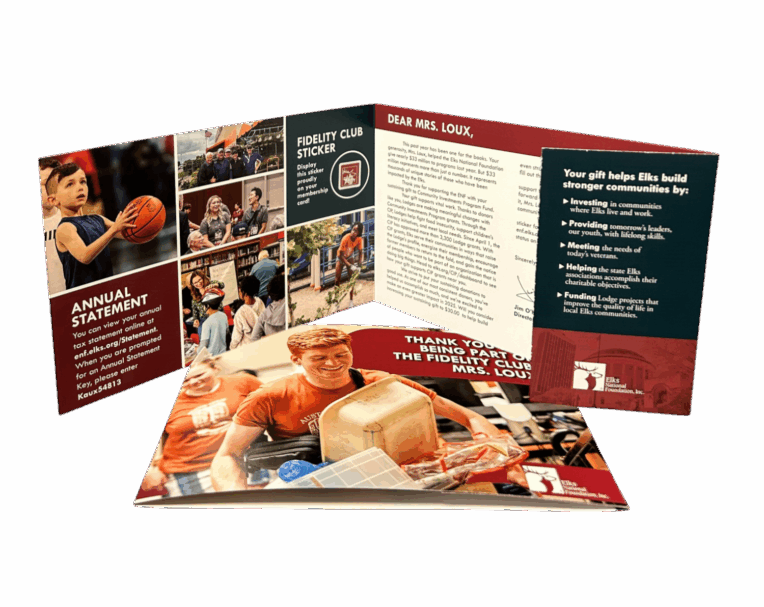 Tri-fold self-mailer for Elks featuring personalized content, reply panel, and full-color design for donor engagement