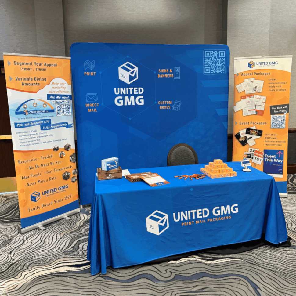 Custom booth signage for United GMG featuring bold branding, large-format graphics, and clean design for trade show displays