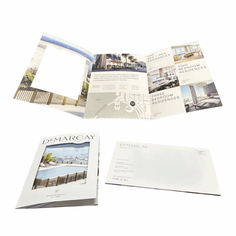 Custom tri-fold mailer for Demarcay featuring refined design and full-color print for real estate direct mail marketing
